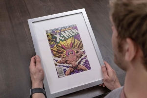 Cornice per esposizione di fumetti nera all'ingrosso 